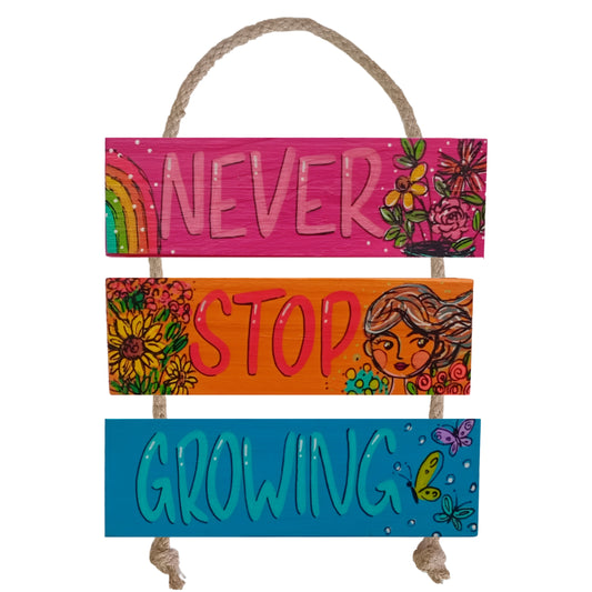 NEVER STOP GROWING - COLGANTE