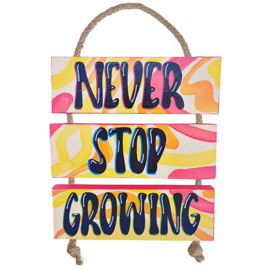 NEVER STOP GROWING - COLGANTE